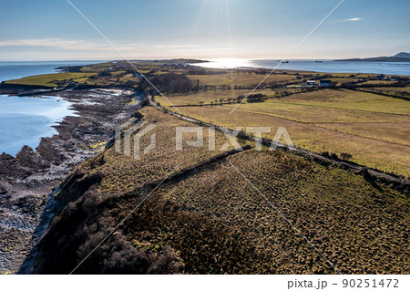 Aerial view of the amazing rocky coast at Ballyederland by St Johns Point in County Donegal - Ireland. 90251472