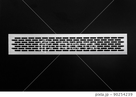 Ventilation air system modern ventilation cooling grille mounted in a black wall, close-up Ventilation air system modern ventilation cooling grille mounted in a black wall, close-up 90254239