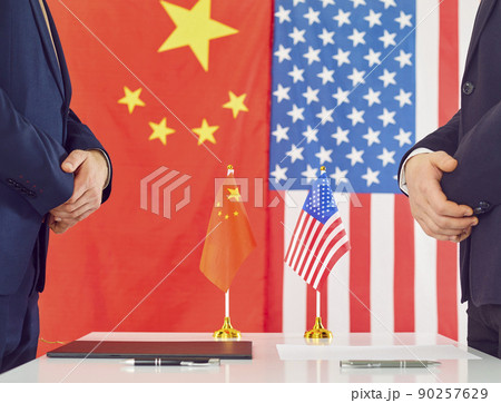 Representatives of China and America in negotiations on terms of ongoing trade war. Representatives of China and America in negotiations on terms of ongoing trade war. 90257629