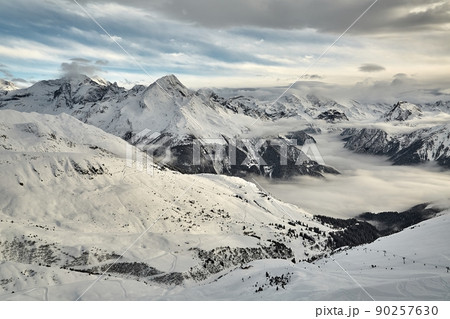 Mountain winter landscape above clouds 90257630