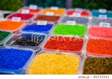 Plastic recycling - heap of colorful secondary granules - close up 90259391