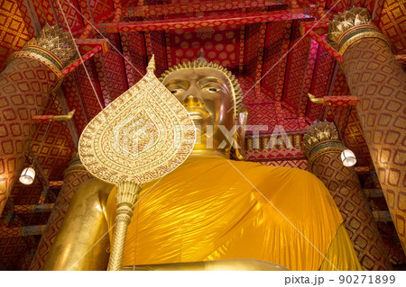 Close up of Big face of Golden Buddha statue temple in Thailand 90271899