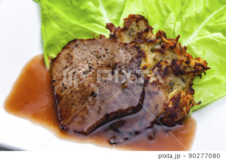 beef steak with sauce served with potato pankcakes beef steak with sauce served with potato pankcakes 90277080