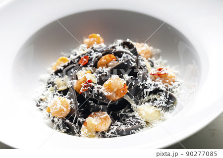 sepia tagliatelle with shrimps and parmesan cheese sepia tagliatelle with shrimps and parmesan cheese 90277085