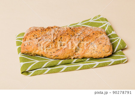 Fresh homemade crisp bread on napkin, top view. Healthy unleavened bread. French bread. Top view Bakery products 90278791