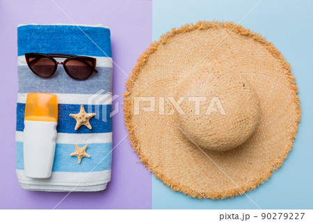Summer vacation concept flat lay. beach accessories and towel top view. Space for text. travel concept Summer vacation concept flat lay. beach accessories and towel top view. Space for text. travel concept 90279227