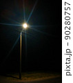 lantern in the darkness over the road 90280757