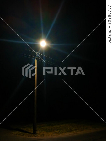 lantern in the darkness over the road lantern in the darkness over the road 90280757