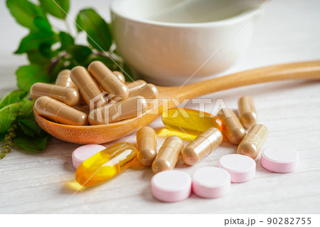 Alternative medicine herbal organic capsule with vitamin E omega 3 fish oil, mineral, drug with herbs leaf natural supplements for healthy good life. 90282755
