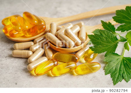 Alternative medicine herbal organic capsule with vitamin E omega 3 fish oil, mineral, drug with herbs leaf natural supplements for healthy good life. Alternative medicine herbal organic capsule with vitamin E omega 3 fish oil, mineral, drug with herbs leaf natural supplements for healthy good life. 90282794