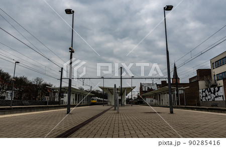 Jette, Brussels Capital Region,  Belgium - Almost empty platforms and tracks of the local jette Railwaystation 90285416