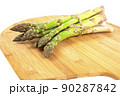 Vegetarian fresh green asparagus. vegetable isolated on white. 90287842