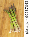 Vegetarian fresh green asparagus. vegetable on wood 90287843