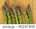 Vegetarian fresh green asparagus. vegetable on wood 90287846