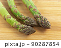 Vegetarian fresh green asparagus. vegetable on wood 90287854
