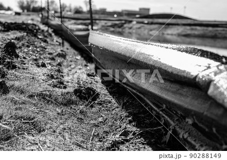 silt fence at a construction site with exposed dirt piled against the fabric silt fence at a construction site with exposed dirt piled against the fabric 90288149