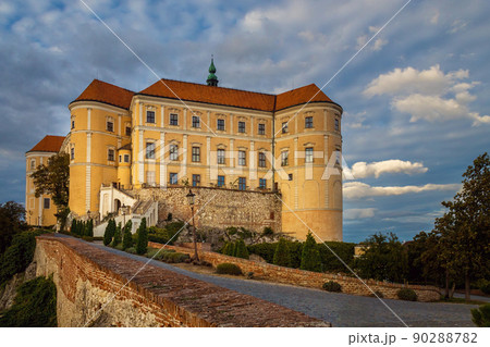 Baroque Castle Mikulov, paved road in the foreground, autumn evening, Czech republic Baroque Castle Mikulov, paved road in the foreground, autumn evening, Czech republic 90288782
