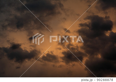 sunset - view of cloudy sky at setting sun 90288878