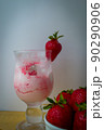 Strawberry ice cream with blurried strawberry and Milk on a foreground. High quality photo 90290906