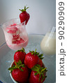 Strawberries ingridient with blurried strawberry ice cream on background. High quality photo 90290909