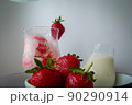 Strawberries ingridient with blurried strawberry ice cream on background. High quality photo 90290914