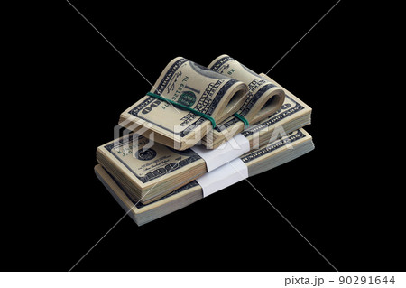 Bundle of US dollar bills isolated on black. Pack of american money with high resolution on perfect black background Bundle of US dollar bills isolated on black. Pack of american money with high resolution on perfect black background 90291644