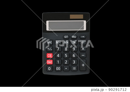 Big black rectangular calculator with solar panel and two red buttons isolated on black 90291712