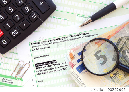 German statement on the assessment of retirement income with calculator and european money close up. The concept of taxation and accountant paperwork Germany German statement on the assessment of retirement income with calculator and european money close up. The concept of taxation and accountant paperwork Germany 90292005