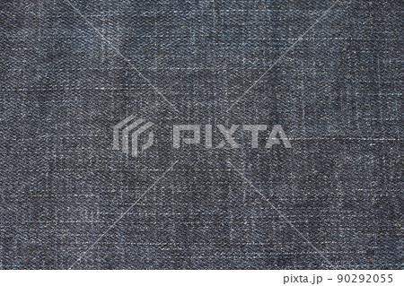 Detailed abstract texture of dark blue denim cloth. Background image of old used denim trousers fabric Detailed abstract texture of dark blue denim cloth. Background image of old used denim trousers fabric 90292055