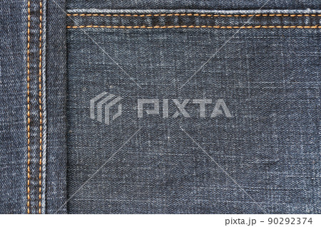 Detailed abstract texture of dark blue denim cloth. Background image of old used denim trousers fabric Detailed abstract texture of dark blue denim cloth. Background image of old used denim trousers fabric 90292374