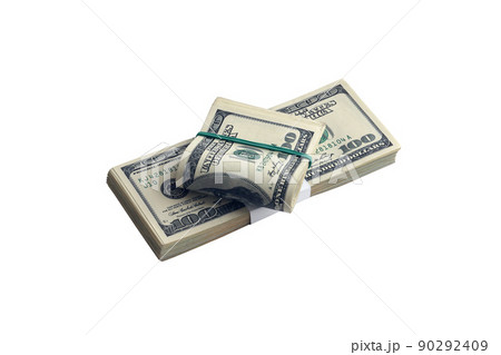 Bundle of US dollar bills isolated on white. Pack of american money with high resolution on perfect white background Bundle of US dollar bills isolated on white. Pack of american money with high resolution on perfect white background 90292409