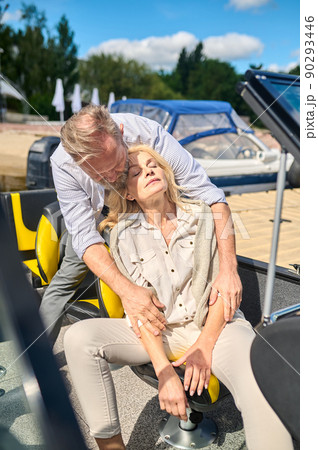 A mature couple looking happy and relaxed spending time together A mature couple looking happy and relaxed spending time together 90293446