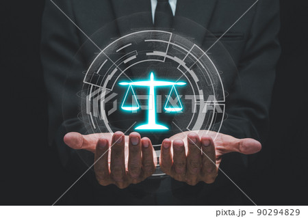 Justice and law concept, Man hand holding VR screen law icon background with blue bokeh.. 90294829