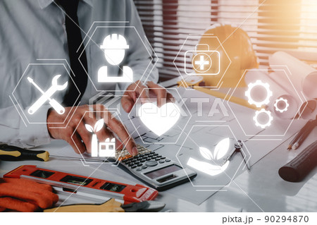 Health safety environment HSE education industry Concept, Engineer working on office desk with VR screen Health safety environment icon.. Health safety environment HSE education industry Concept, Engineer working on office desk with VR screen Health safety environment icon.. 90294870