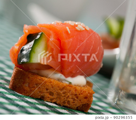 Sandwich with salmon, cucumber, sauce 90296355