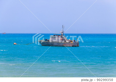Warship anchored in the Indian ocean near Zanzibar, Tanzania Warship anchored in the Indian ocean near Zanzibar, Tanzania 90299350