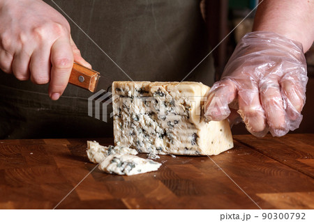 Cheese shop. Roquefort. Selective focus. Close up. 90300792