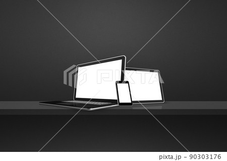 Laptop, mobile phone and digital tablet pc on black wall shelf. Horizontal background 90303176