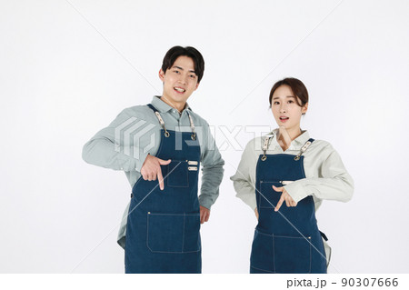 start up concept asian korean young woman and man with hand motions 90307666