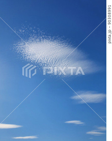 Abstract cirrus clouds on the blue sky background. Beautiful cloudscape scene 90308991
