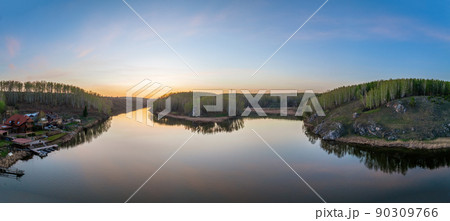 Confluence of the Iset and Kamenka rivers in the city Kamensk-Uralskiy. Iset and Kamenka rivers, Kamensk-Uralskiy, Sverdlovsk region, Ural mountains, Russia. Aerial view 90309766