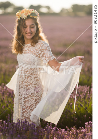 Summer wedding bride dress in Provence lavender field meadow. hispanic young woman landscape Summer wedding bride dress in Provence lavender field meadow. hispanic young woman landscape 90321485