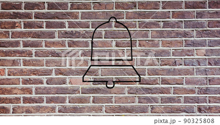 Image of glowing neon bell icon on brick wall 90325808