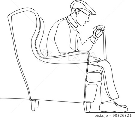mature man sitting in an armchair 90326321