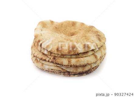 Pita bread isolated on white background. Traditional food of Arabic cuisine and culture Pita bread isolated on white background. Traditional food of Arabic cuisine and culture 90327424
