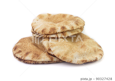 Pita bread isolated on white background. Traditional food of Arabic cuisine and culture Pita bread isolated on white background. Traditional food of Arabic cuisine and culture 90327428