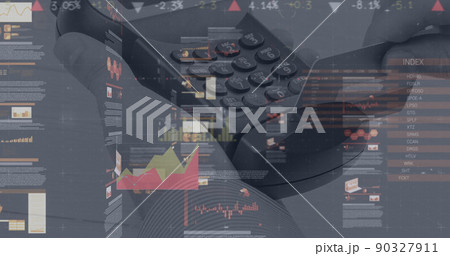 Image of graphs and financial data over hand of caucasian man holding payment terminal Image of graphs and financial data over hand of caucasian man holding payment terminal 90327911