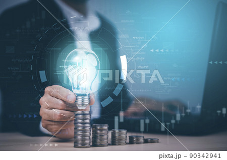 Businessman hand hold light bulb with line connect and Coins stack on the wooden table, technology and Saving ideas and investment budget, Creative ideas concept of saving money concept, Copy space Businessman hand hold light bulb with line connect and Coins stack on the wooden table, technology and Saving ideas and investment budget, Creative ideas concept of saving money concept, Copy space 90342941