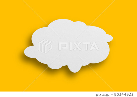 White paper in speech bubble shape set against yellow background. 90344923
