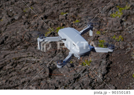Drone protection flying during the day in volcano mountains Drone protection flying during the day in volcano mountains 90350185